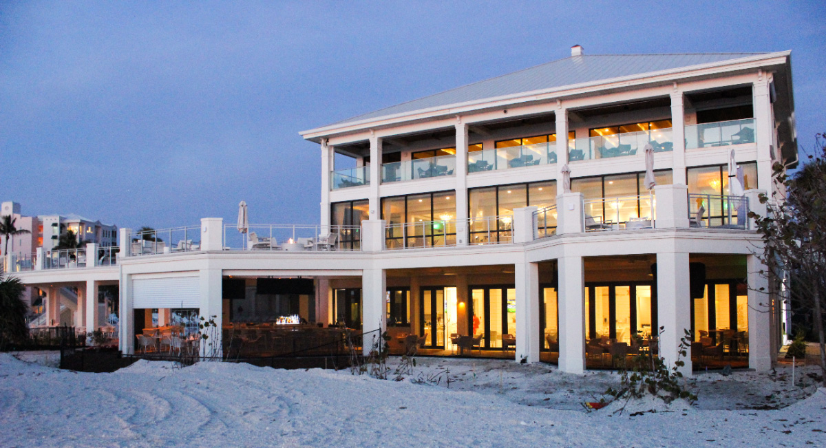 Beach-front-restaurant-building-twilight–-Club-at-Barefoot-Beach