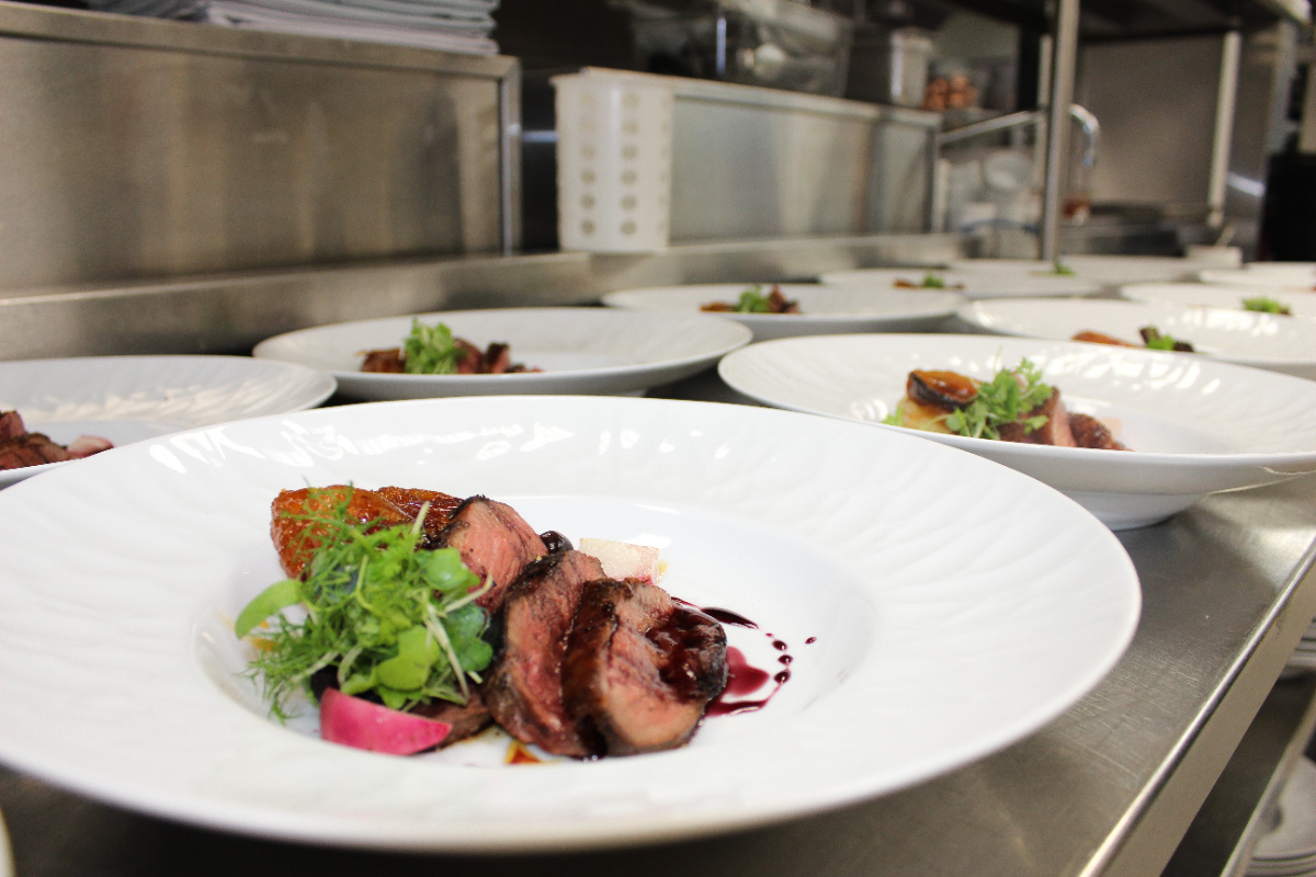 Restaurant-plated-duck-breast-dinner-dishes–-Club-at-Barefoot-Beach