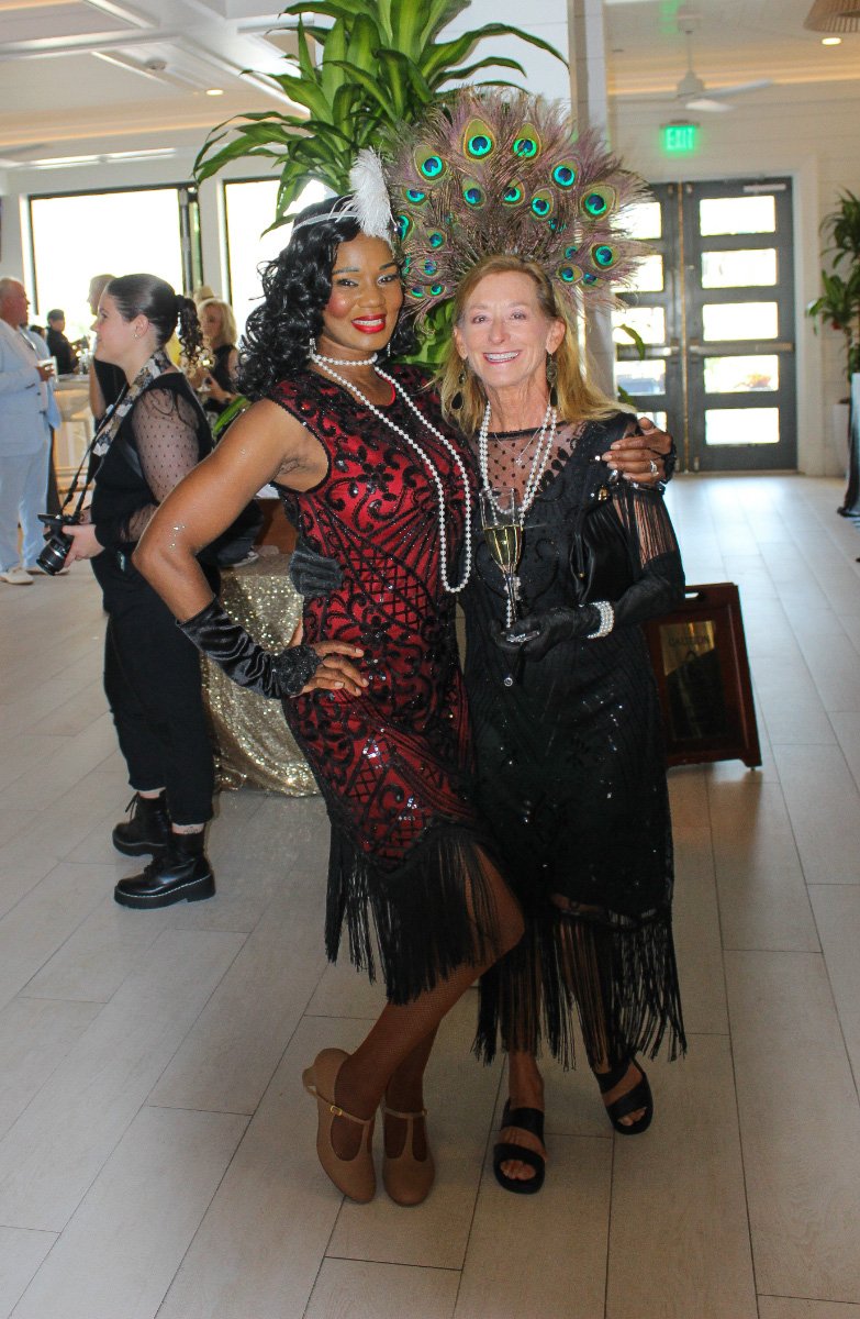 Roaring-20s-flapper-dresses-peacock-headpiece–-Club-at-Barefoot-Beach